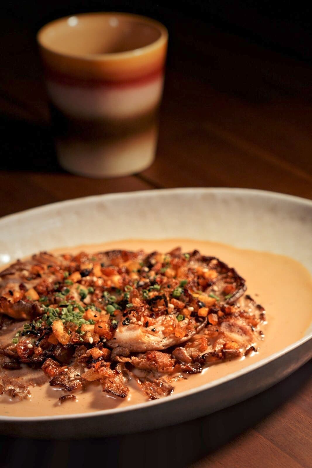 A mushroom dish served in a wide bowl at TEJÁ.